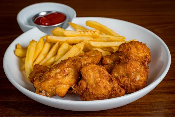 Chicken Wings & Fries at Autentica Taqueria in Miami